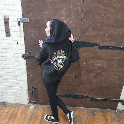 Model wearing a custom fleece pullover hoodie with a vampire graphic on the back